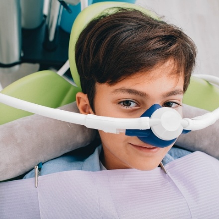 Child receiving nitrous oxide dental sedation