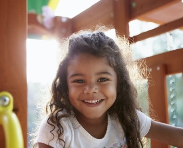 Child smiling after restorative dentistry