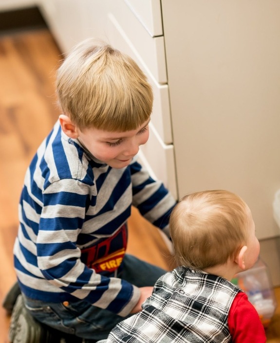 Two kids at dental office smiling