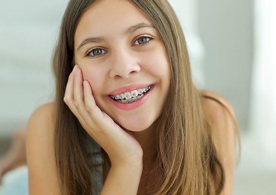 Portrait of teen girl with braces