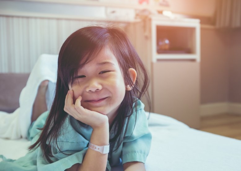 Child smiling during sedation dentistry visit