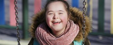 Young child smiling after special needs dental visit