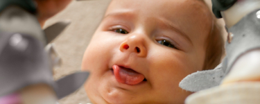 Child being examined before lip and tongue tie treatment