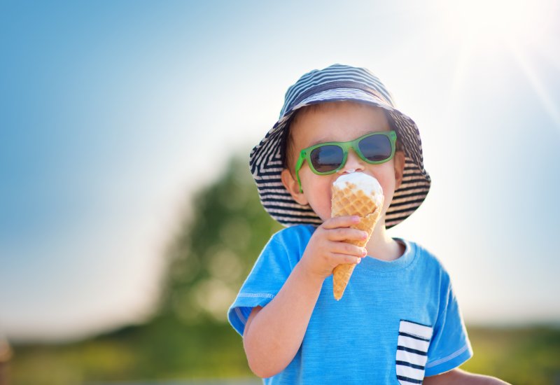 child eating an ice cream cone