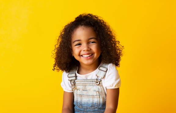 child on a yellow background
