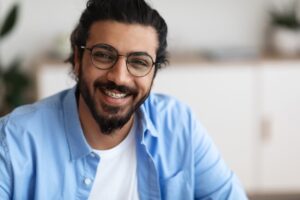 Adult man with braces. 